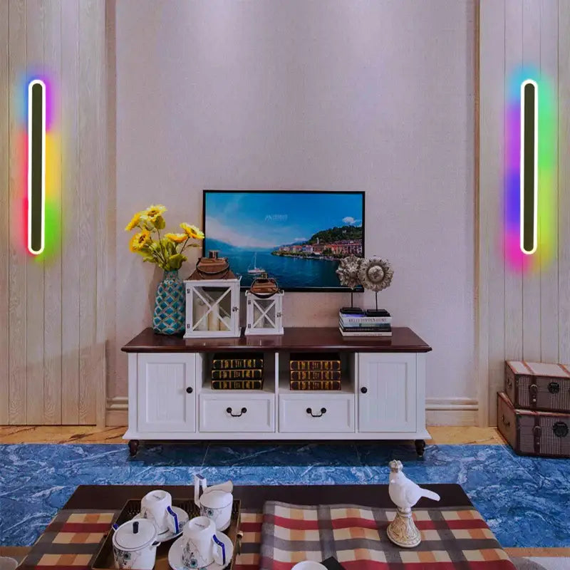White wooden media console with dark brown top and black handles next to a decorbites led rgb wall light for indoor decoration