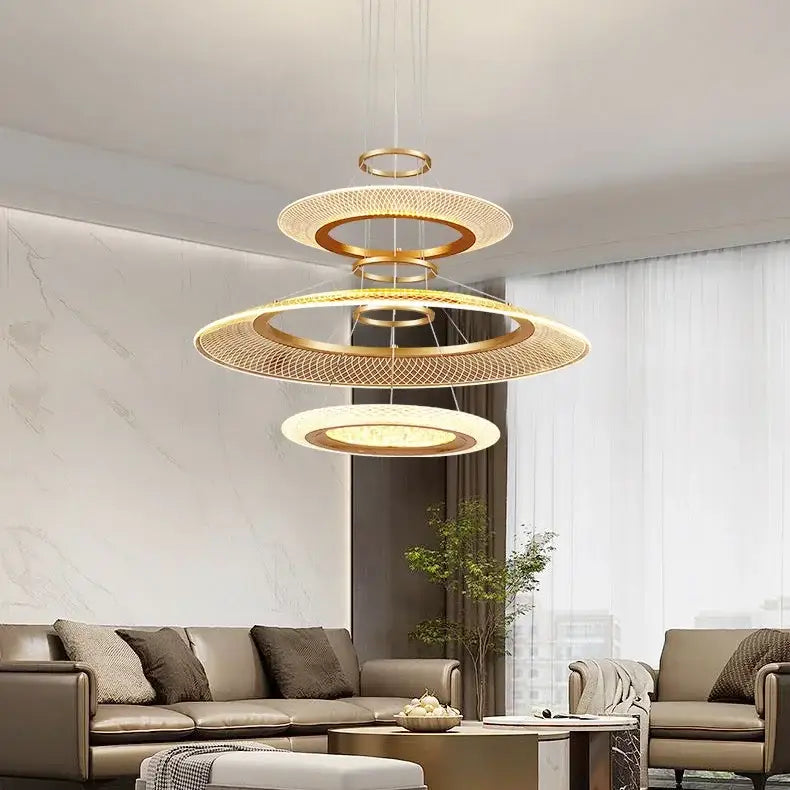 Modern gold-toned decorbites led ring ceiling chandelier with woven mesh and illuminated tiered circular rings for luxury spaces