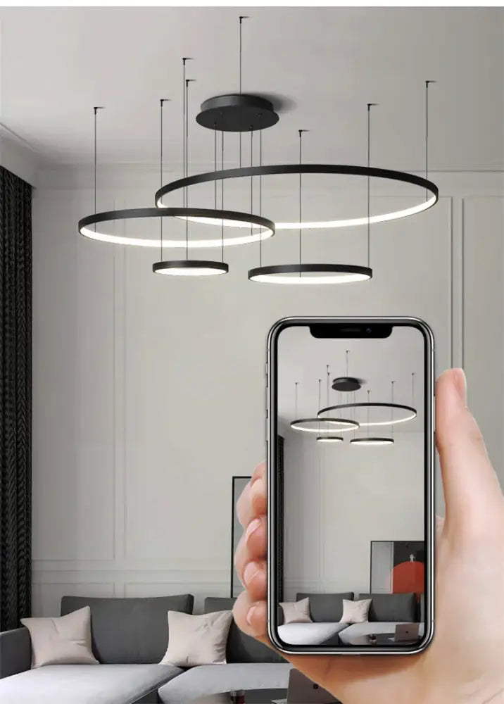 Modern black circular led ring chandelier with sleek minimalist design for ceiling lighting by decorbites