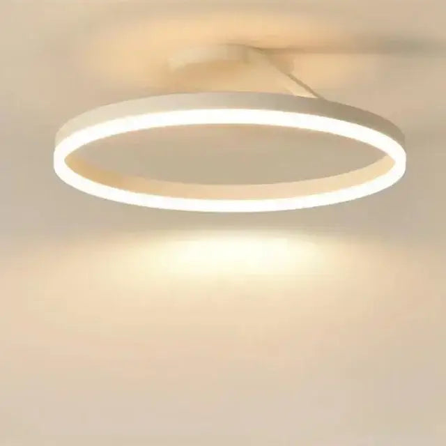 A sleek white circular led ring chandelier with a modern minimalist design for dining living room bedroom decor