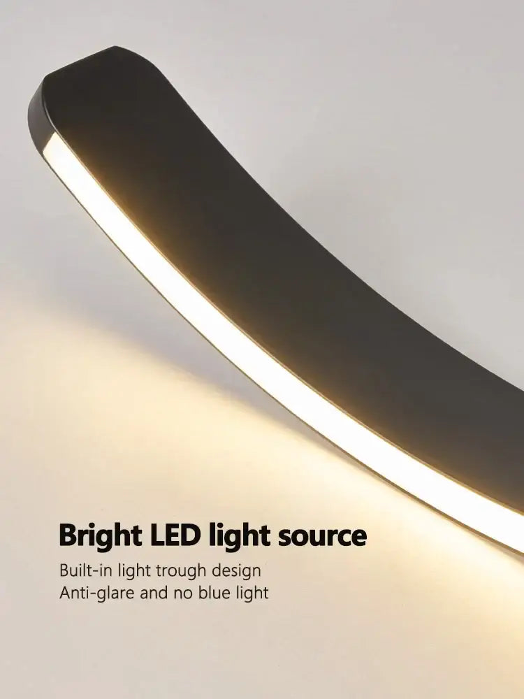 Modern black curved wall sconce with built-in led light source complementing decorbites™ led ring chandelier in nordic style