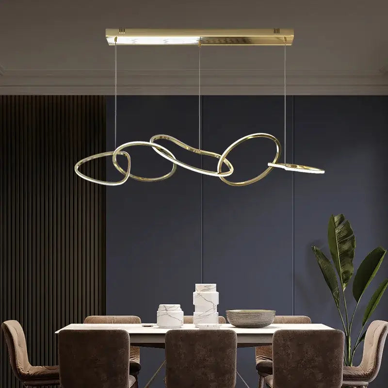 Gold-toned decorbites led ring chandelier with interlocking circular rings and sleek rectangular fixture for living room lighting
