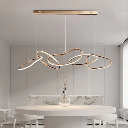 Modern gold-toned led ring chandelier with flowing interconnected circular rings for living and dining room decor