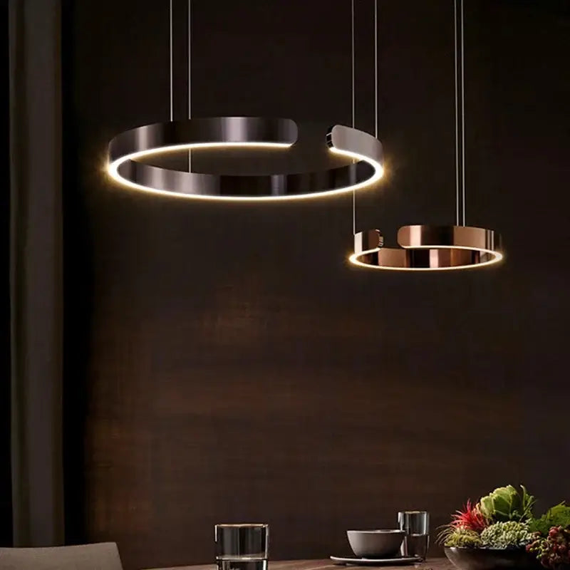 Modern led ring chandelier with sleek metallic rings and warm led glow for dining room lighting and decoration