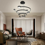 Modern black circular led ring chandelier with multiple concentric rings and embedded led lights by decorbites for dining and living rooms