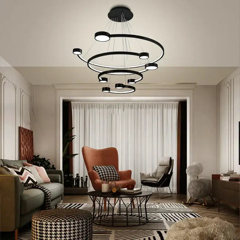Modern black circular led ring chandelier with multiple concentric rings and embedded led lights by decorbites for dining and living rooms