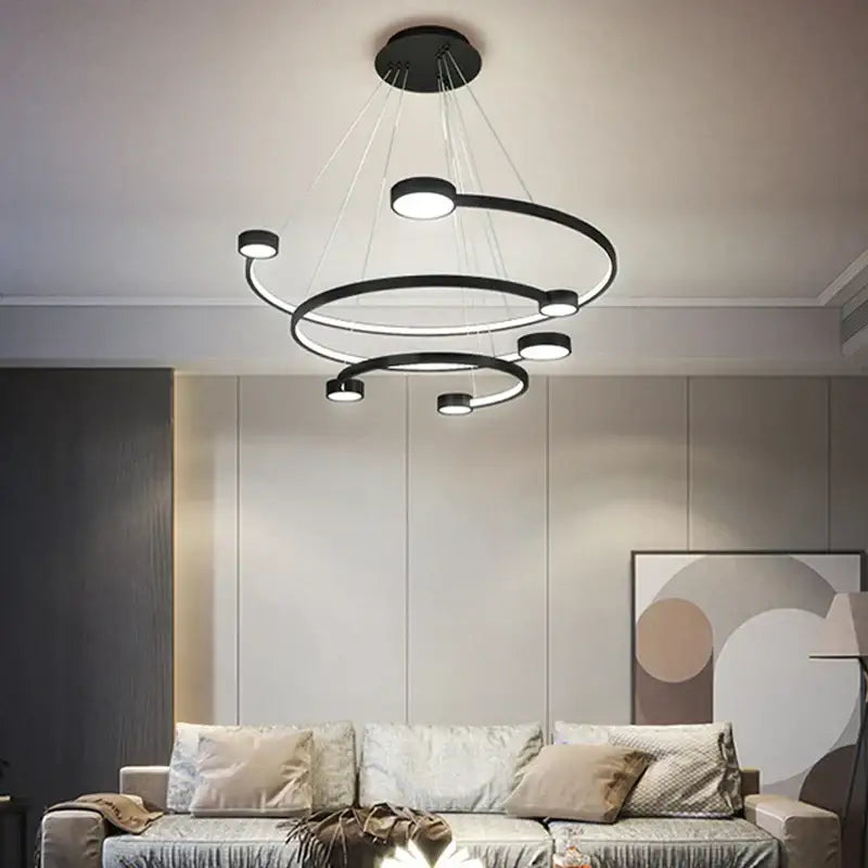 Modern black led ring chandelier with multiple concentric rings and embedded led lights for dining and living rooms