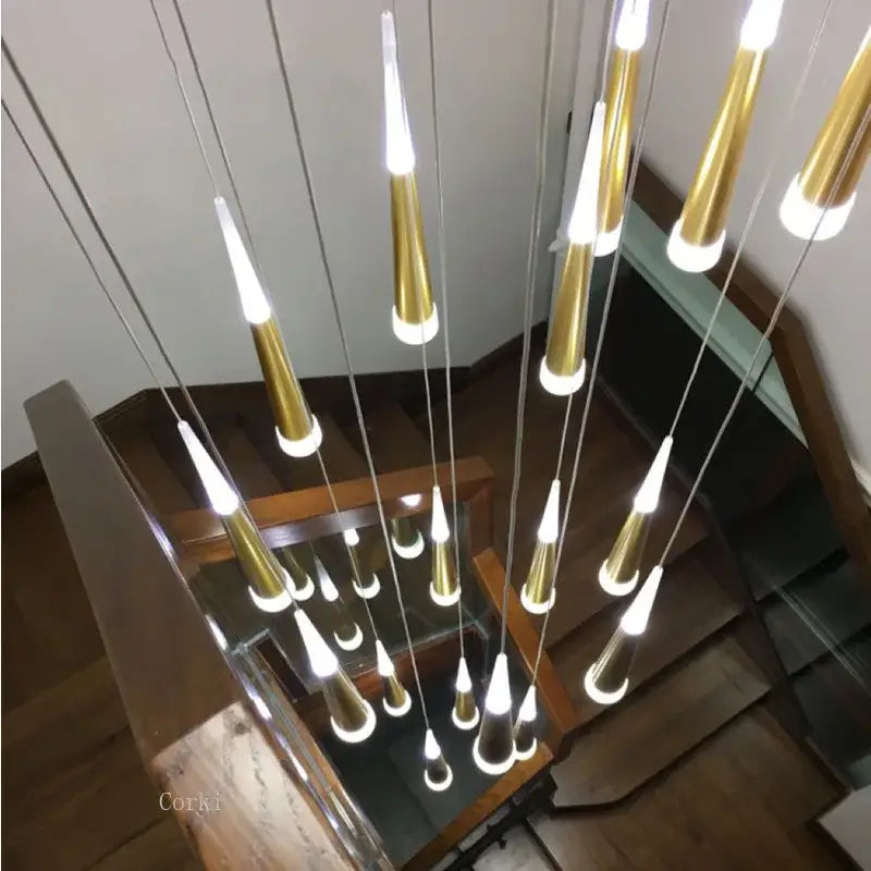 Golden cone-shaped pendant lights with frosted glass tips in decorbites™ led ring chandelier for modern villa decor lighting