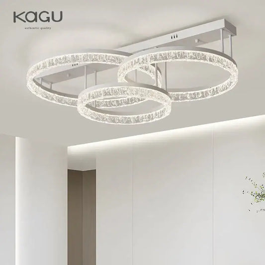 Modern white kagu led ring chandelier with three interlocking crystal rings for elegant home décor lighting