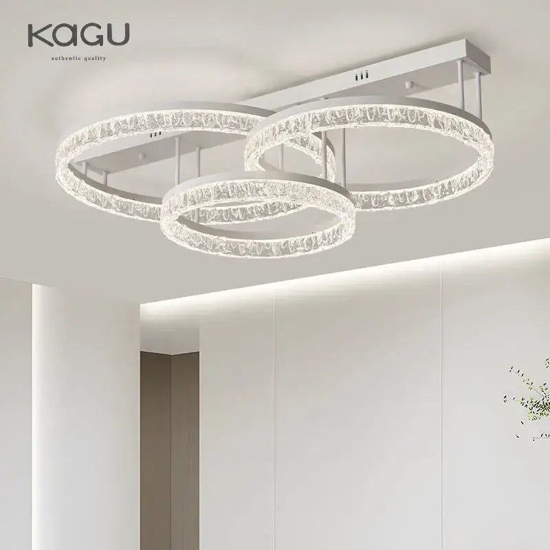 Modern white kagu led ring chandelier with three interlocking crystal rings for elegant home décor lighting