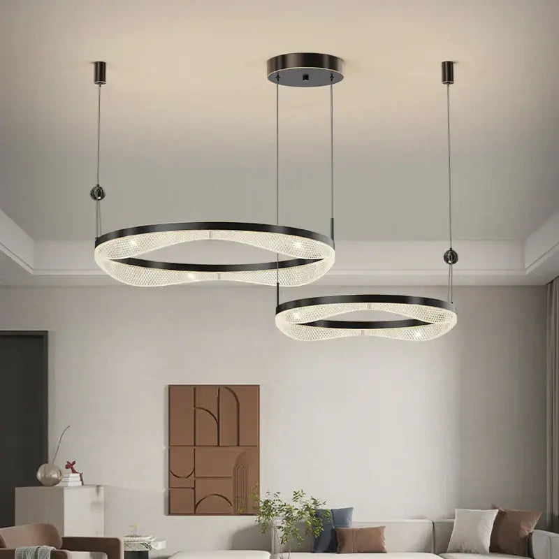 Modern black and clear crystal decorbites™ led ring pendant chandelier with sleek circular design for living and dining room