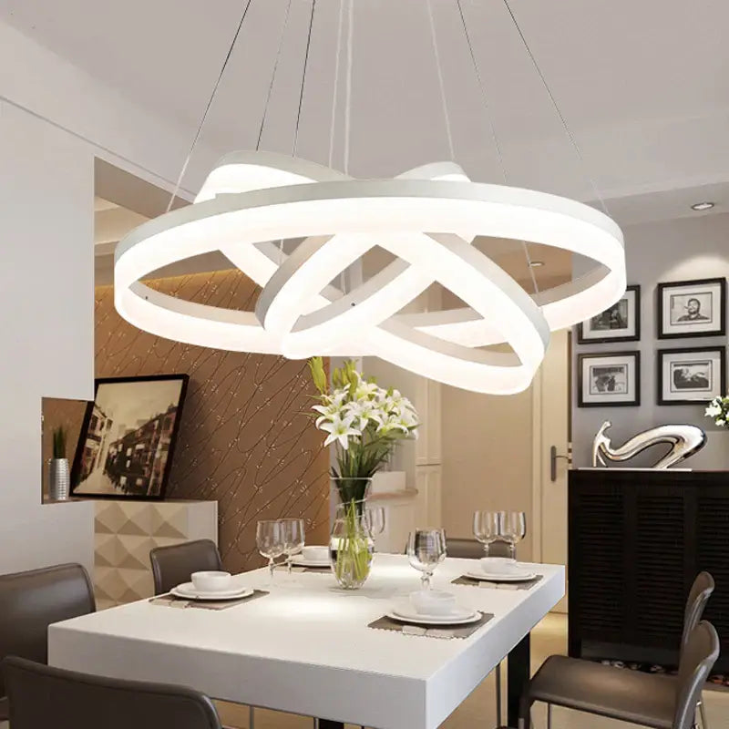 Modern white led ring pendant light fixture with interlocking circular rings for living room and dining room lighting