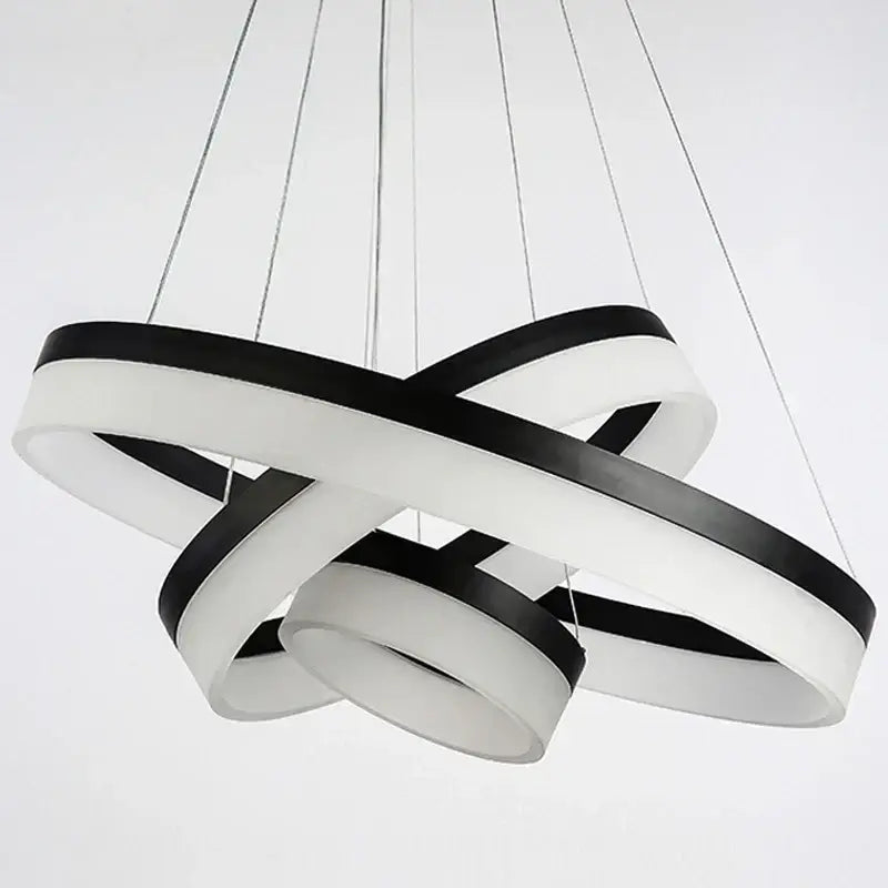 Modern black and white DecorBites™ led ring pendant light fixture with sleek interlocking rings for living room lighting