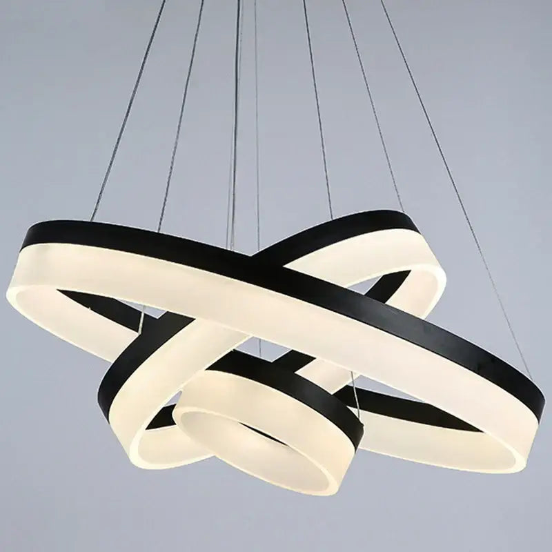Modern black and white led ring pendant light with interlocking circular rings for living room and dining room lighting