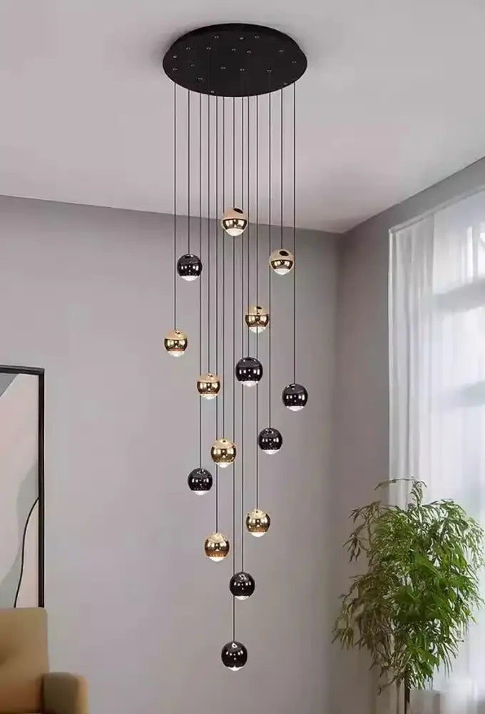Modern black and gold spherical pendant chandelier with circular ceiling mount and adjustable heads size diameter for home decor