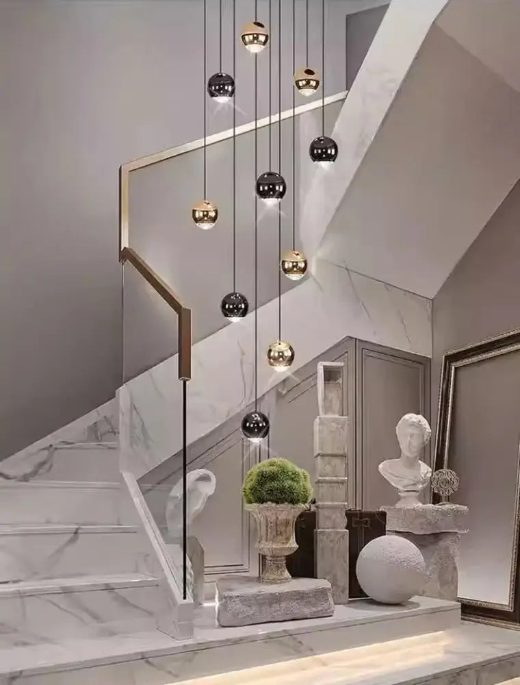 A modern DecorBites™ LED ring pendant light with spherical gold and black heads size diameter for stylish home decor