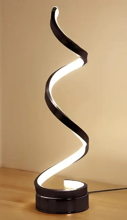 Black spiral led ring table lamp with sleek modern design and illuminated inner curve for nordic bedroom lighting
