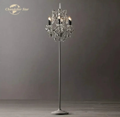 Elegant DecorBites™ LED Rococo crystal iron floor lamp with slender metallic stand and candle-like bulbs in chandelier style