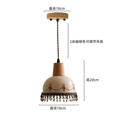 Cream-colored ceramic led rose flower pendant lamp with wooden top base brown patterns and tassels for modern decor
