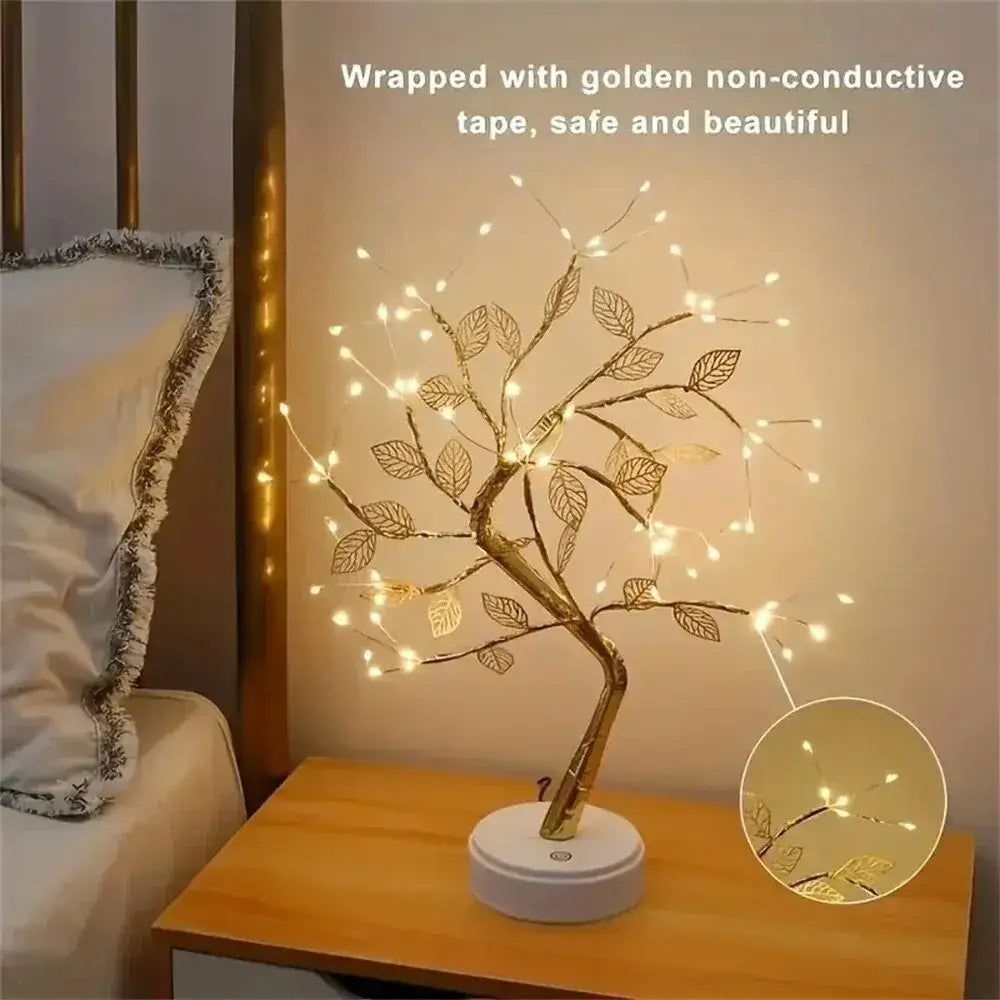 Golden tree-shaped led lamp with delicate rose leaf design and warm lights perfect as a christmas tree fairy decoration