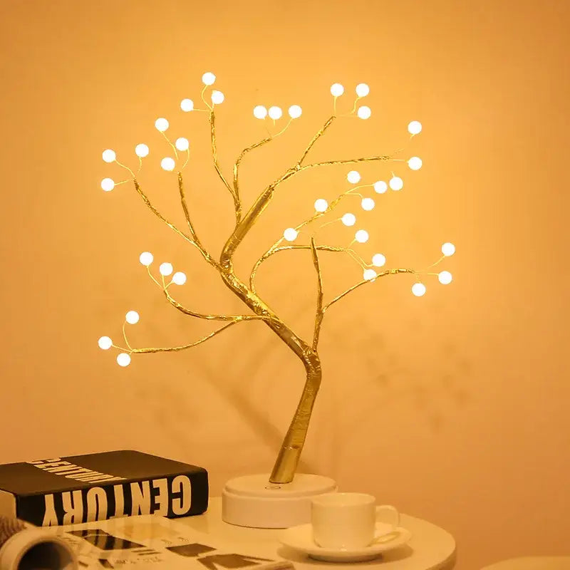 Golden tree-shaped led lamp with glowing white lights on branches decorbites™ christmas tree fairy light for home decor