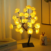 Glowing yellow led rose tree lamp with dark brown branches and black usb powered base for home decor and gifts