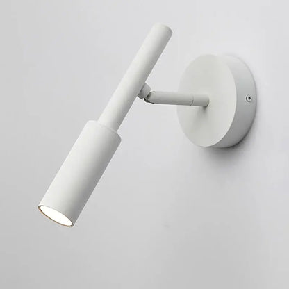White cylindrical DecorBites™ led rotatable wall lamp with adjustable arm and circular base for bedroom lighting