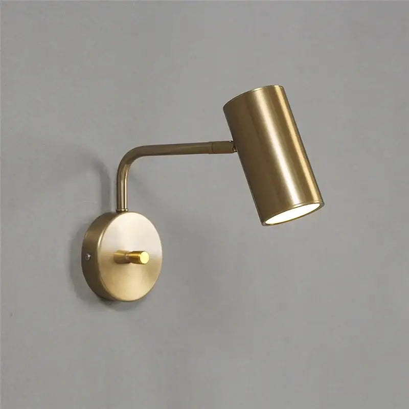 Brass-finished wall lamps with cylindrical head and adjustable arm in DecorBites™ led rotatable wall lamps collection
