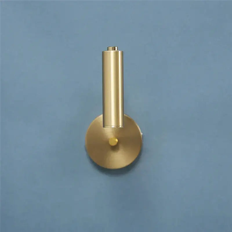 Gold-toned cylindrical decorbites™ led rotatable wall lamp with minimalist brushed metal finish and sleek design