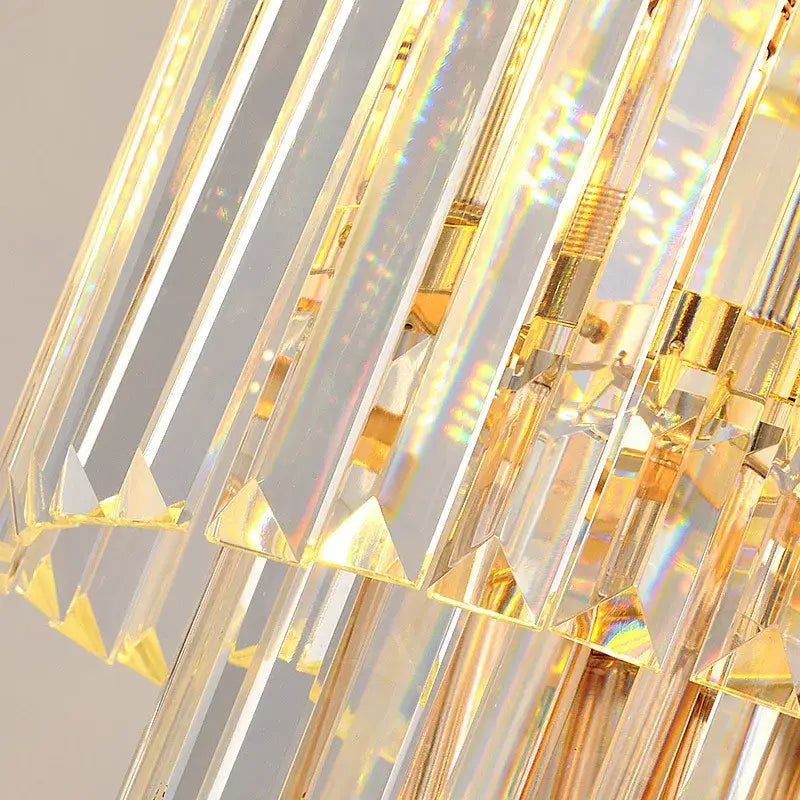 Decorbites™ led rotating staircase chandelier with clear crystal prisms and gold accents for luxurious duplex and villa décor