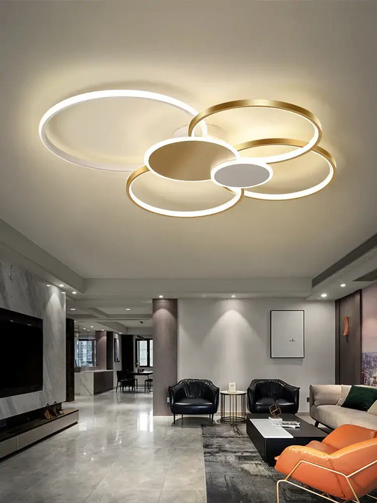 DecorBites™ modern ceiling chandelier with overlapping gold and white LED round ceiling rings for living room decor