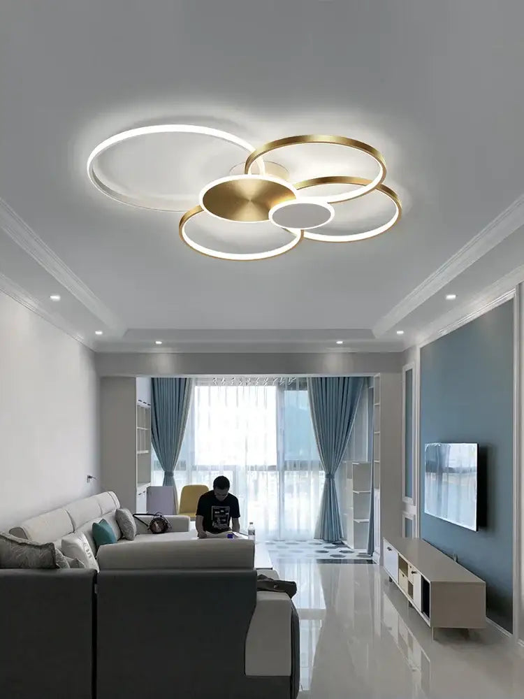 Modern decorbites™ led round ceiling chandelier with overlapping gold and white rings for minimalist living room decor