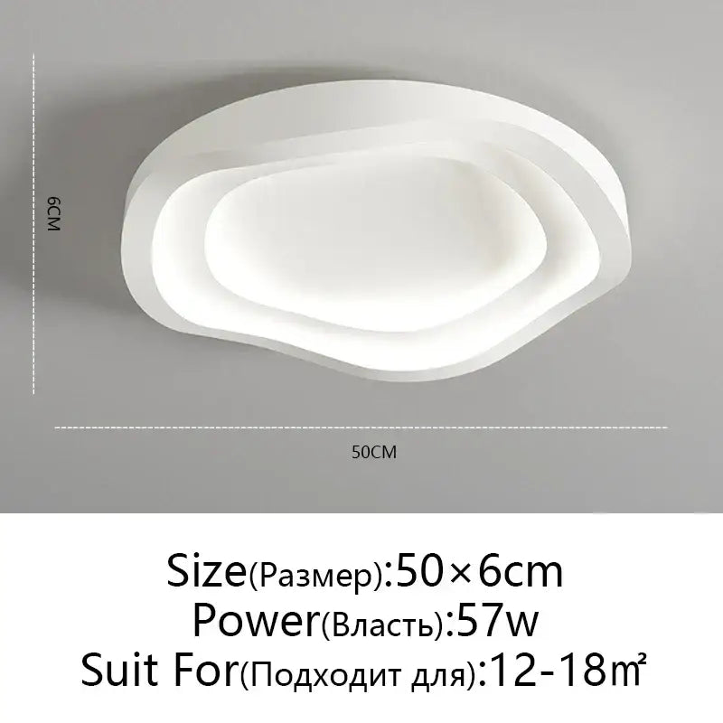 Modern white DecorBites™ LED round ceiling lamp with layered organic design and remote control dimming for indoor lighting