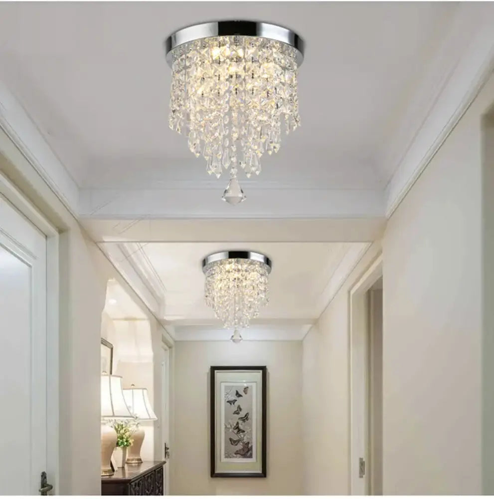 Chrome-finished decorbites led round ceiling light with clear glass prisms and polished metal base for bright room lighting
