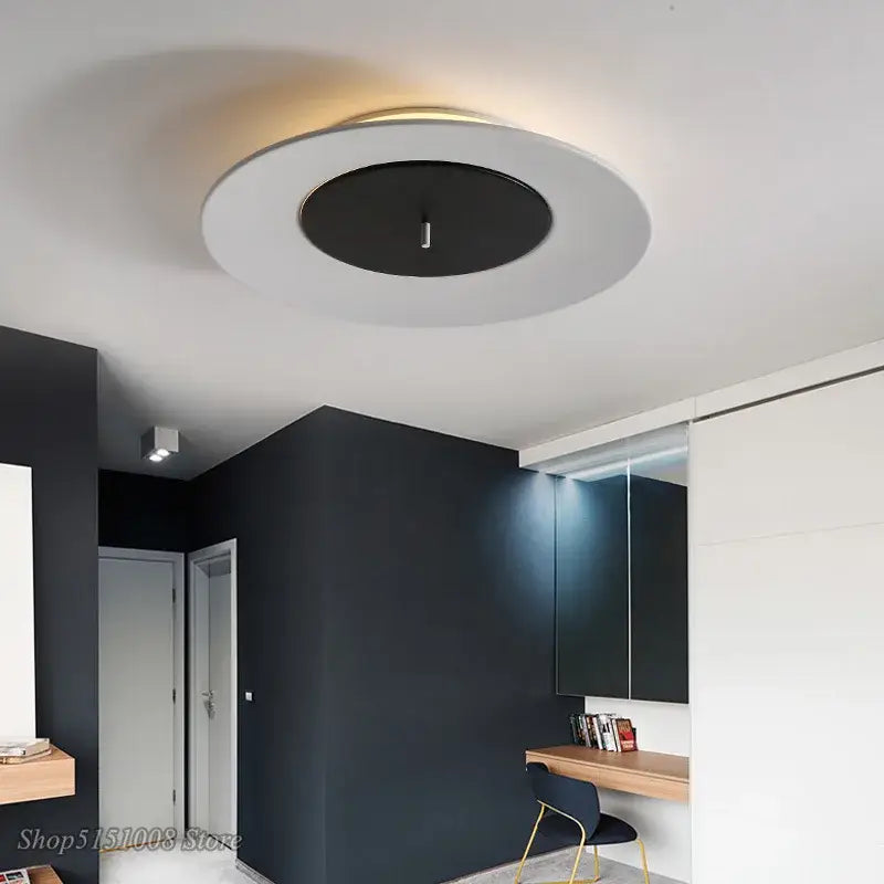 Decorbites™ led round ceiling light with sleek white outer ring and black disc emitting warm ambient glow for indoor decor
