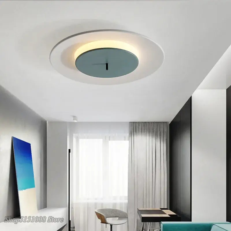 Decorbites™ led round ceiling light with layered design featuring white ring, warm glow, and teal disc for indoor use