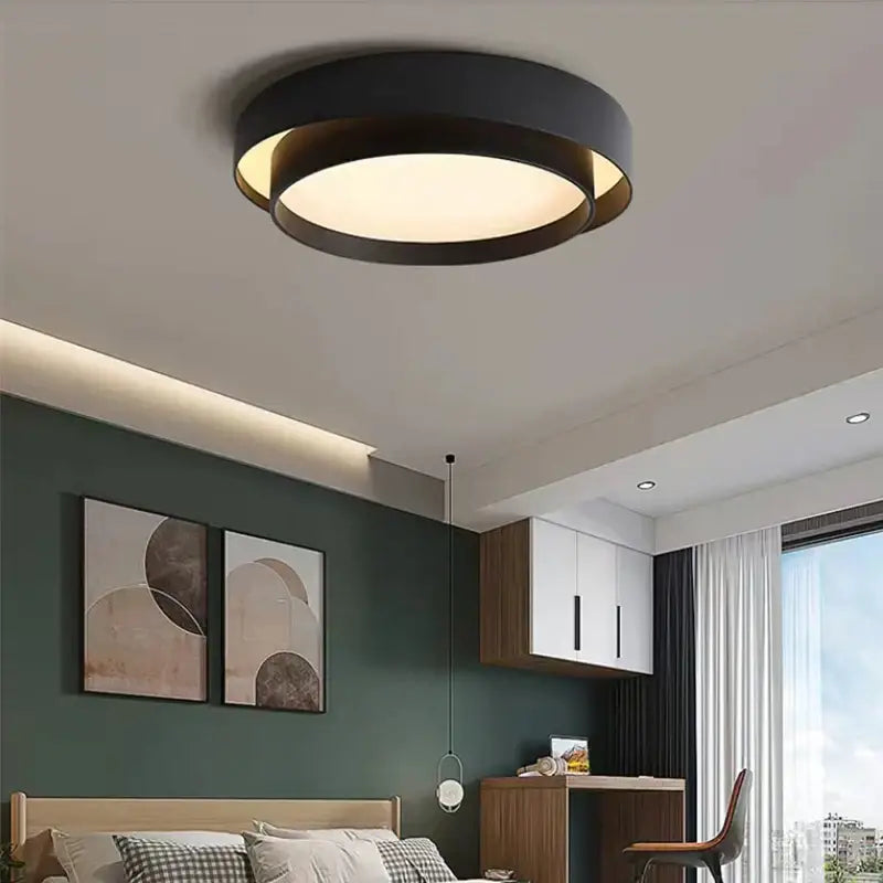Modern black DecorBites™ led round ceiling light with warm glow and concentric rings for living rooms and bedrooms