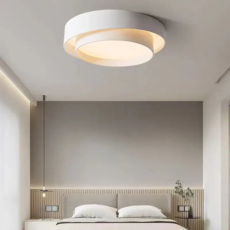 Modern white DecorBites™ LED round ceiling light with layered design and warm glow for living room and bedroom