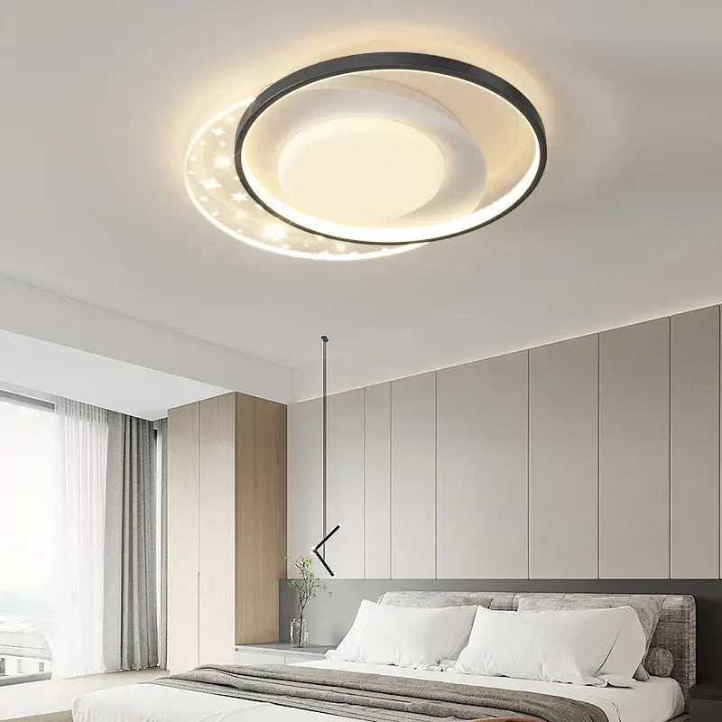 Decorbites™ led round ceiling light with black outer ring warm white inner glow and star shaped led accents for indoor use