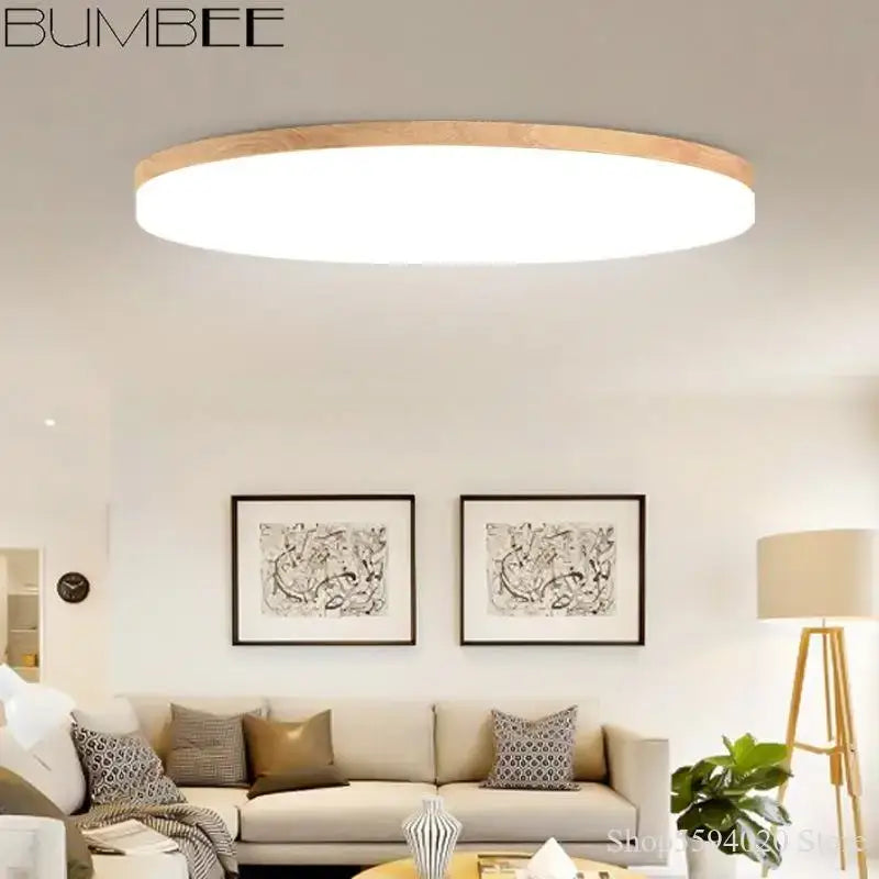Decorbites™ led round ceiling light by bumbee featuring a wooden rim and white illuminated center for modern interiors