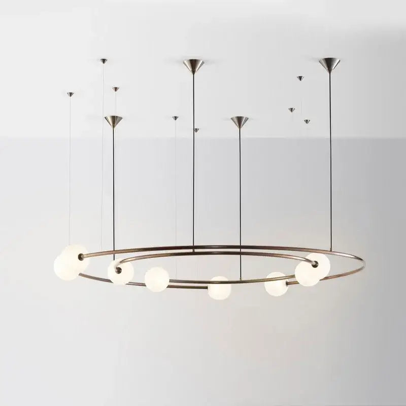 Modern minimalist decorbites™ led round chandelier pendant light with brushed brass circular frames and frosted glass bulbs
