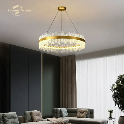 Decorbites led round glass chandelier with gold-toned circular frame and cascading crystal prisms for modern interiors