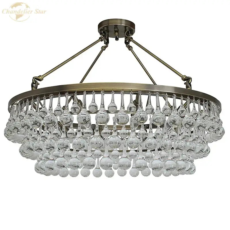 Brass-finished DecorBites led round glass chandelier with teardrop crystal pendant lights for modern living spaces