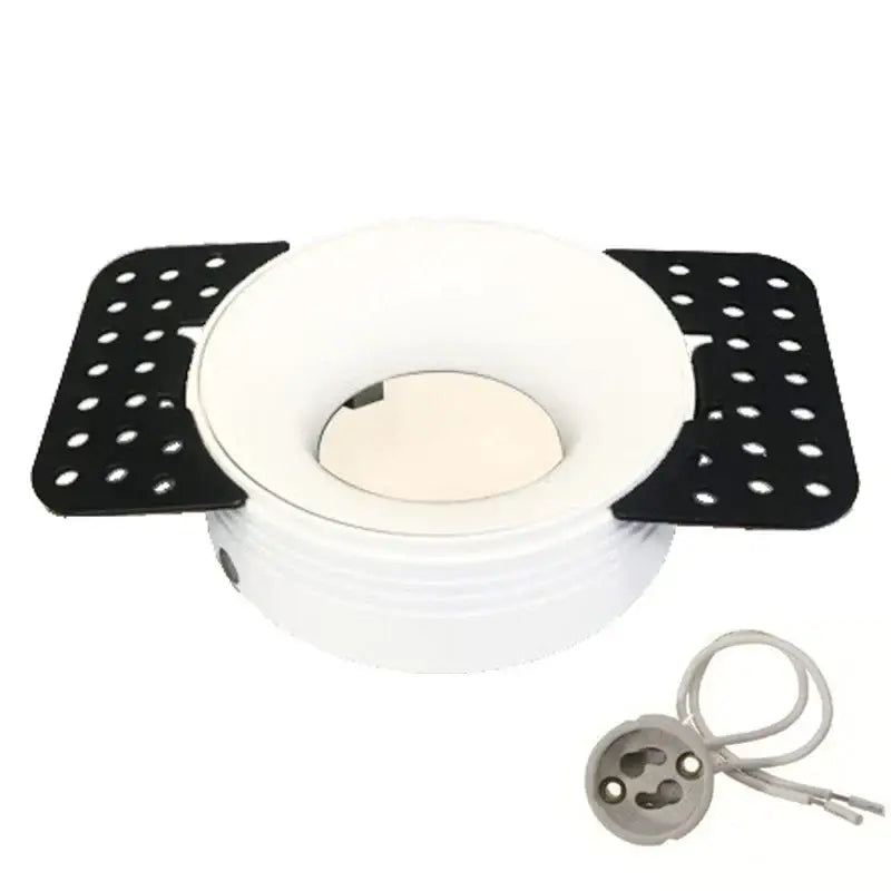 White decorbites led round recessed ceiling downlight with black perforated side panels and gray bulb socket holder