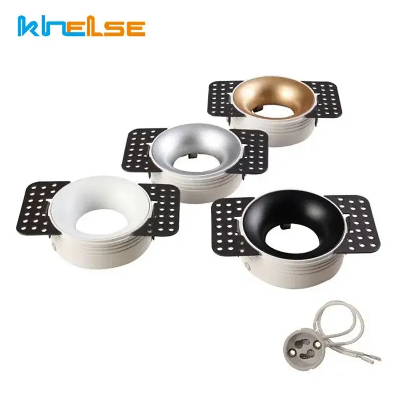 Set of three decorbites led round recessed ceiling downlights with matte white brushed silver and gold interiors