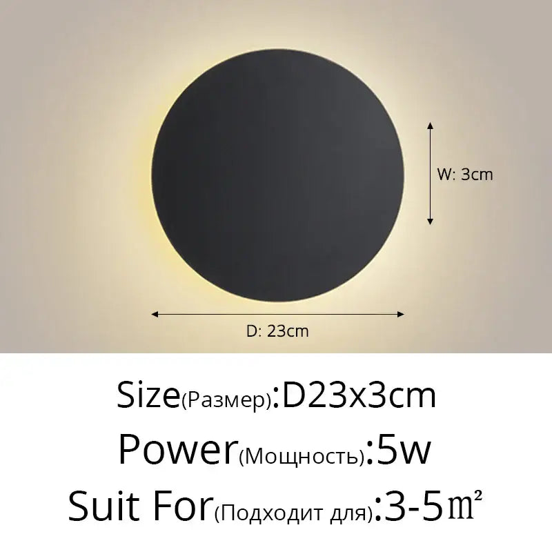 A sleek circular black matte decorbites led round touch wall lamp with soft glowing illumination for bedroom decor