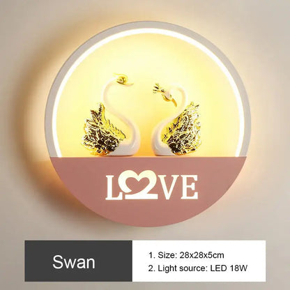 Circular DecorBites LED round wall lamp with white swans gold-leafed wings warm yellow backlight for children room