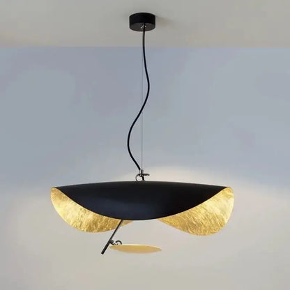 Black and gold leaf-shaped decorbites led saucer pendant light with sleek modern design for living room ambiance