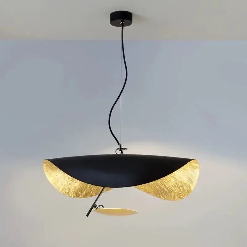 Black and gold leaf-shaped decorbites led saucer pendant light with sleek modern design for living room ambiance