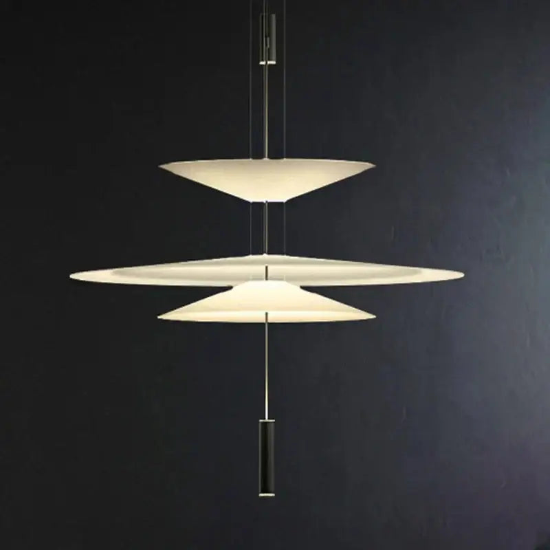 Modern decorbites led saucer pendant light with three off-white disc shades suspended by slender metallic rods